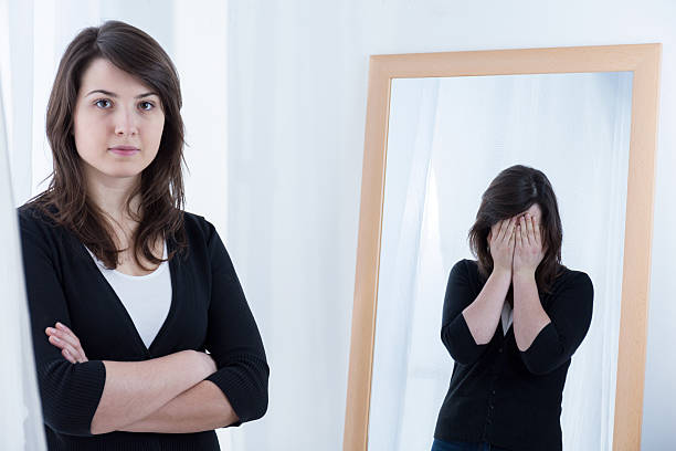 istock Woman hiding her bad mood 499391270
