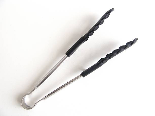 Kitchen Tongs Kitchen Tongs metal clip stock pictures, royalty-free photos & images