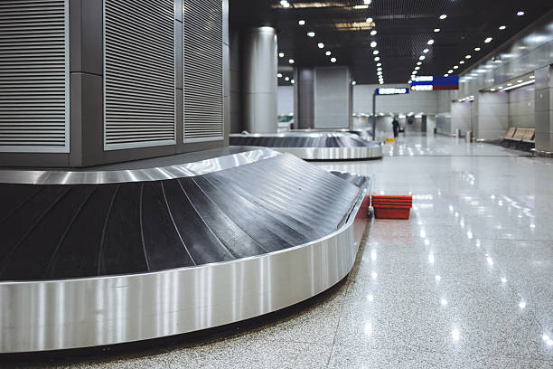 istock Baggage conveyor belt in the airport 499391464