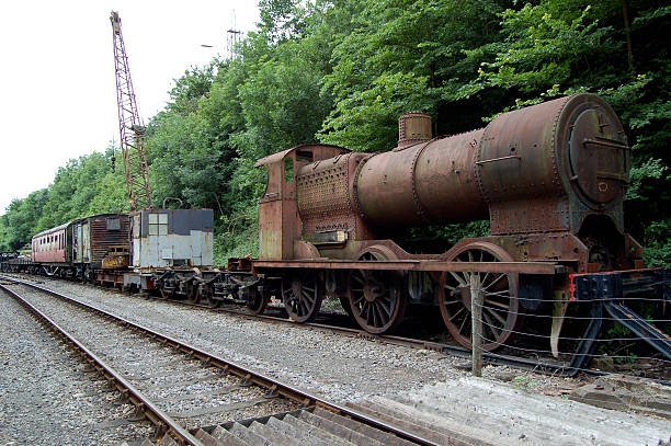 istock Disused Steam Train and Carriage in Railway Siding 499391800
