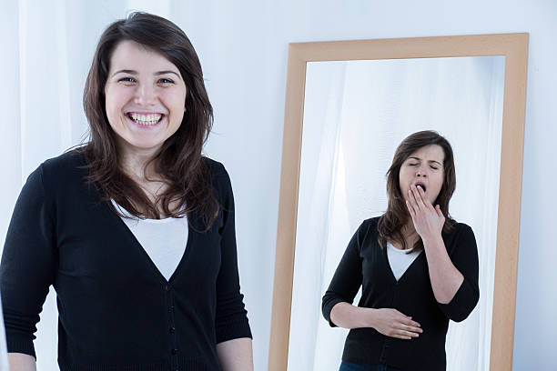 istock Woman with fake smile 499391870