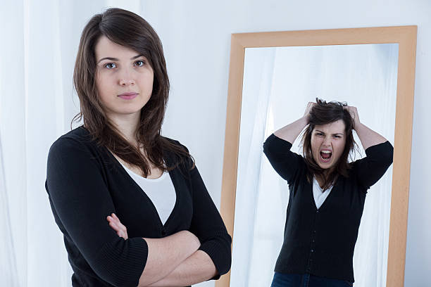 istock Woman hiding her emotions 499392136