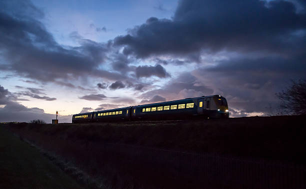 istock Train travelling at speed as day breaks 499392788