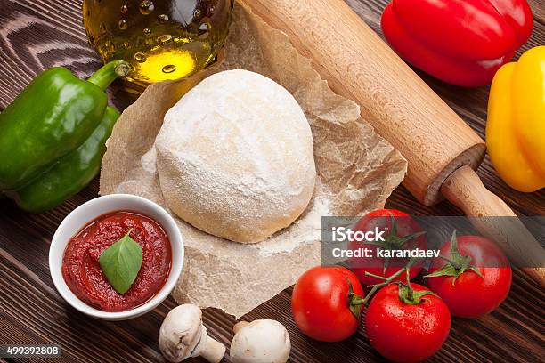 Pizza Cooking Ingredients Stock Photo - Download Image Now - 2015, Backgrounds, Basil