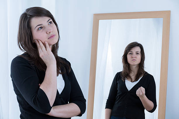 istock Young woman masking her emotions 499392922
