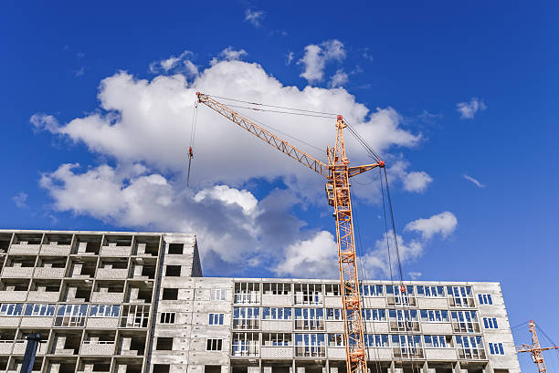 istock Highrise houses and crane 499393034