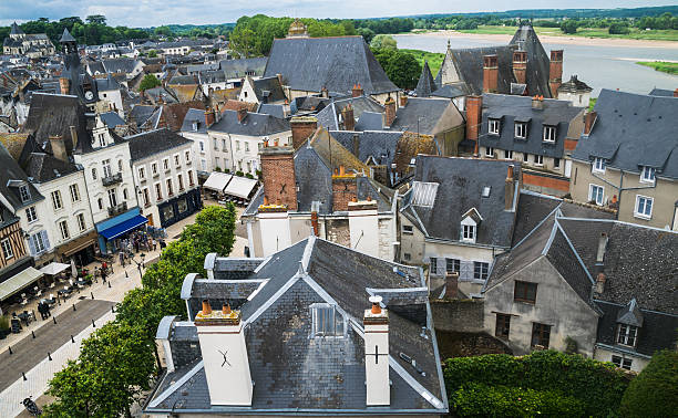 A roof with two dormers. One of the houses surrounding the monestery of Le Mont Saint Michelle in France.
