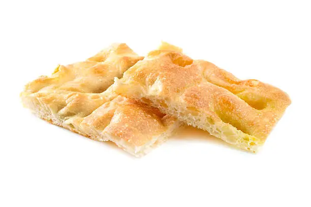 Ligurian focaccia bread on a white background