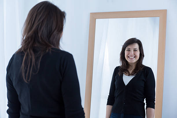 istock Girl wearing a fake smile 499393604