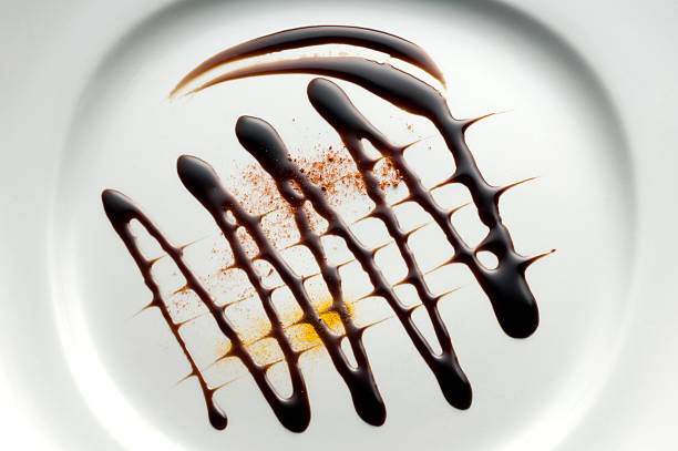 istock drawing with chocolate syrup on the plate 499396396