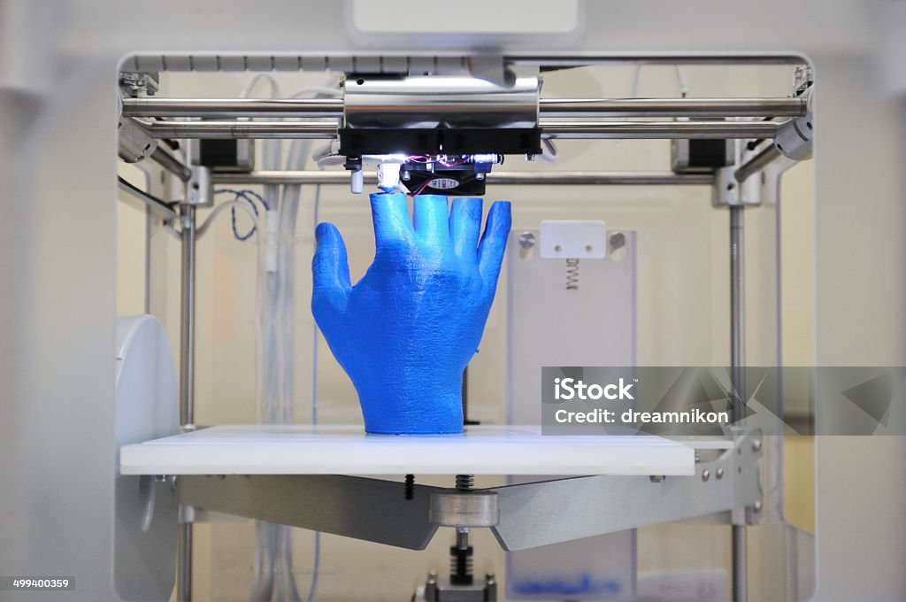 3D printer I have a 3D printer output in the form of a hand  3D Printing Stock Photo