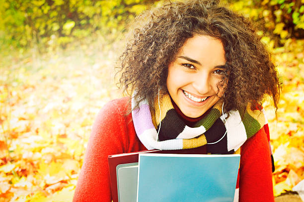 istock Female student in warm autumn 499402965