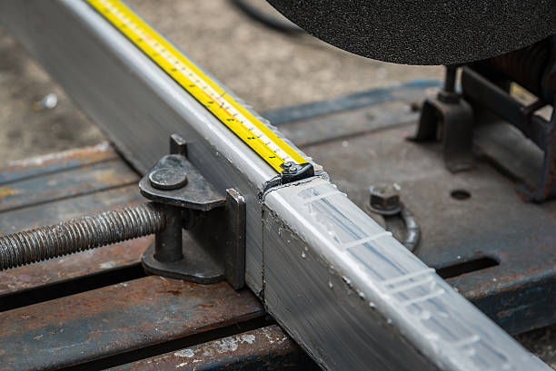 istock measuring a metal that already cut 499403038