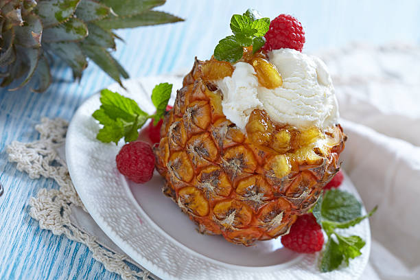 istock Fruit sorbet ice cream in small pineapple 499403573