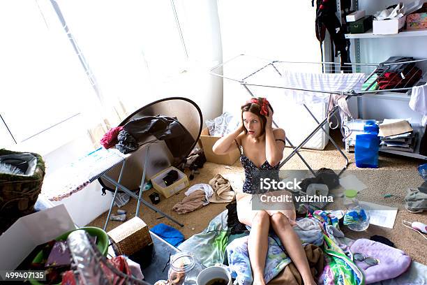 Beautiful Woman Is Expressing Panic In Her Really Messy Room Stock Photo - Download Image Now