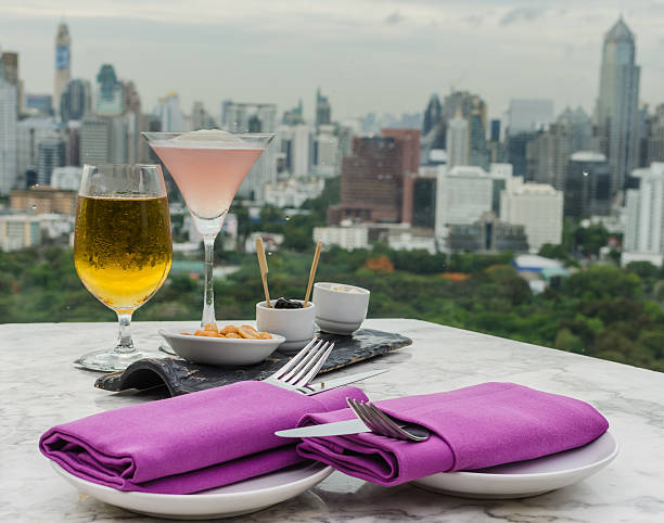 istock Glass of beer and cocktail with fork and knife 499407155