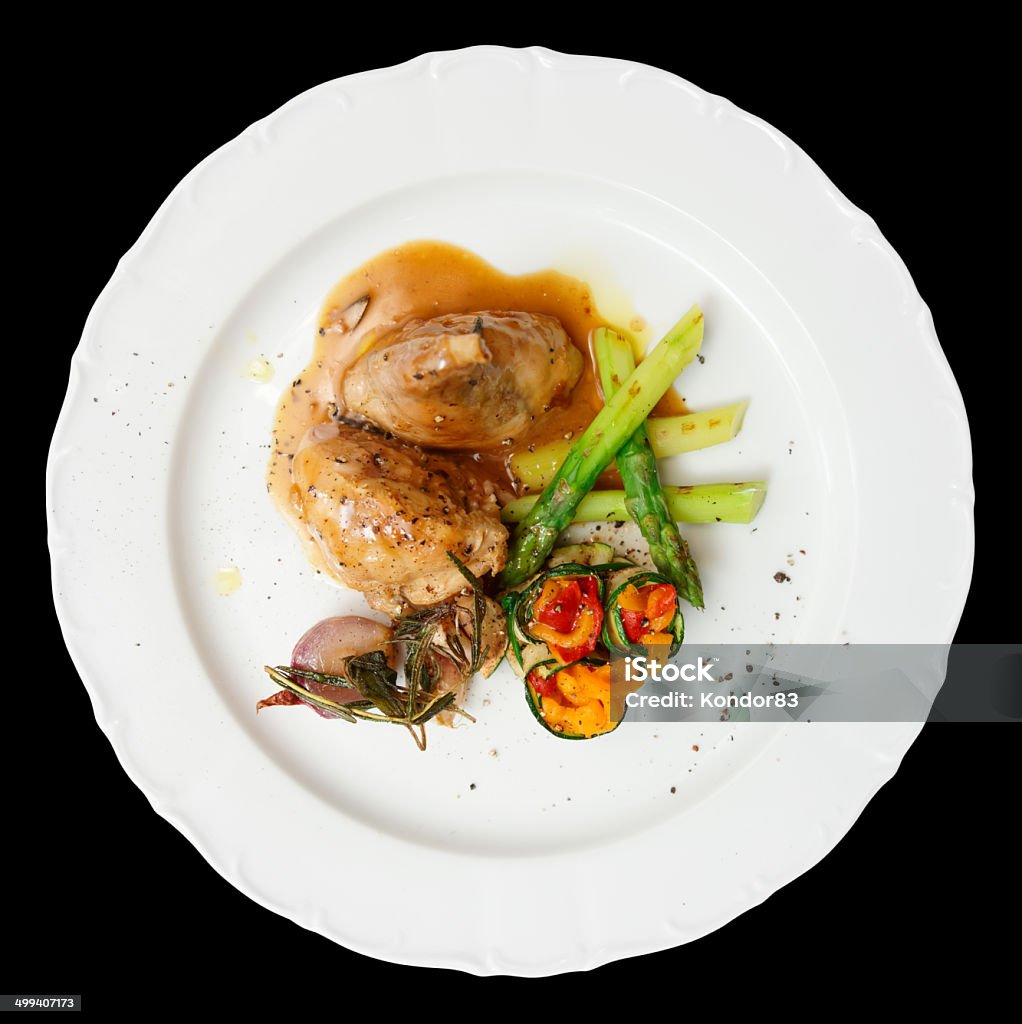 Rabbit stew with vegetables Rabbit stew with vegetables isolated on black Fried Stock Photo