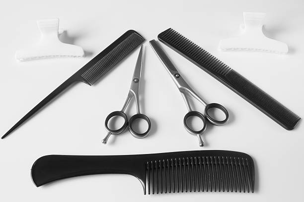 istock hairdressers tools scissors comb clips 499418062