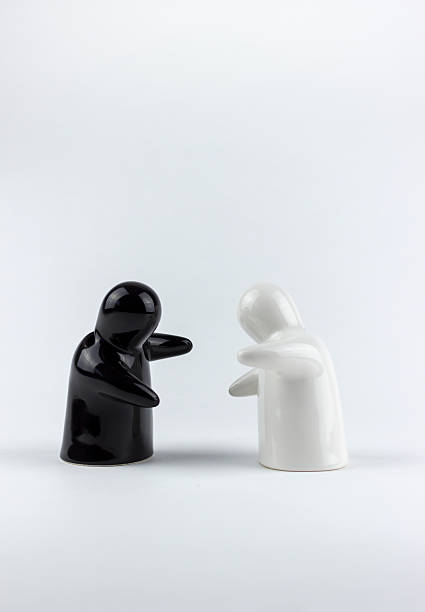 istock Two porcelain men on a white background 499418740