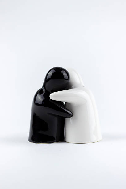 istock Two porcelain men on a white background 499418856