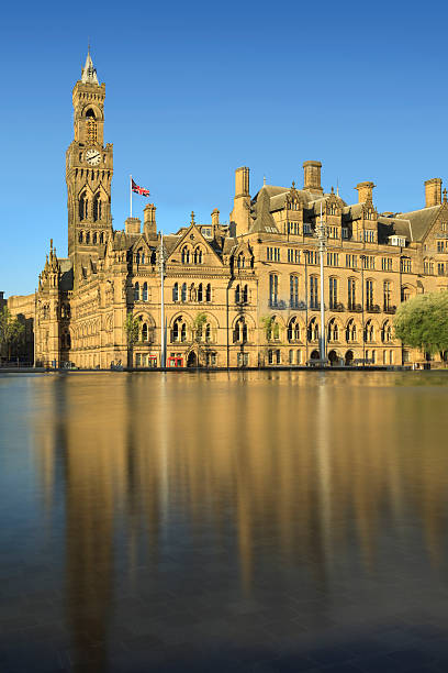 istock Bradford City Hall reflected in the mirror pool in Centenary Square. 499419809