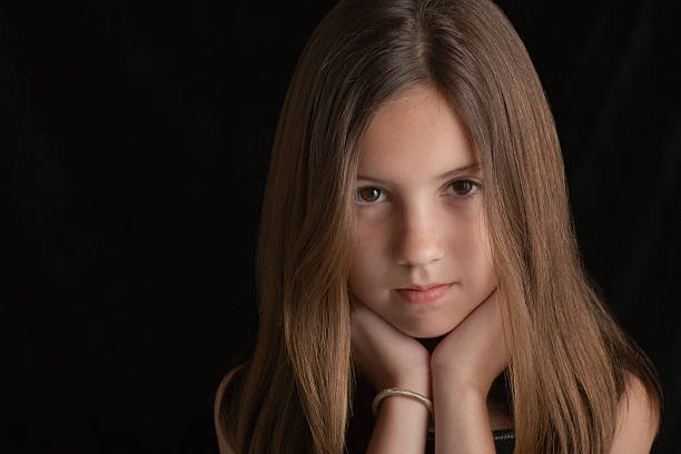 istock Brunette Girl Resting Chin On Hands 499419813