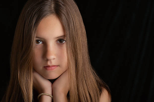 istock Brunette Girl Resting Chin On Hands 499419817