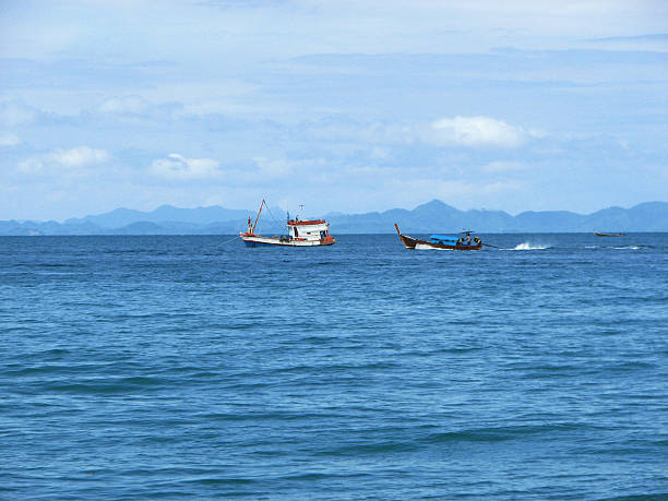 istock Longtail boats on the sea, Krabi 499420819