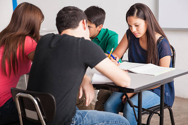 istock Teenagers studying at school 499420957