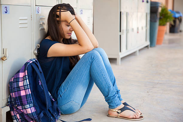 Having some trouble at school Teenage girl stressed out about some high school drama sad 15 years old girl stock pictures, royalty-free photos & images
