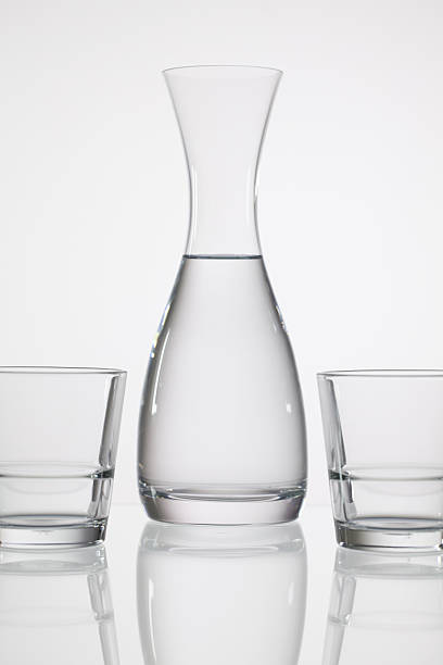 istock Glasses of water on the glass table 499423706