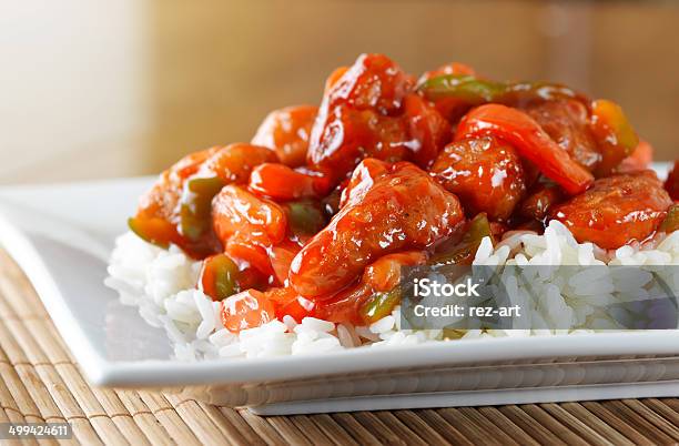 Sweet And Sour Chicken On Rice Stock Photo - Download Image Now - Chinese Food, Sweet And Sour Chicken, Sweet And Sour Dish