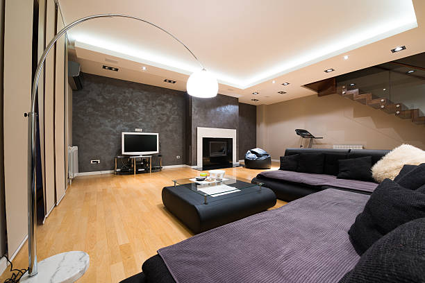 istock Interior of a luxury spacious living room with modern fireplace 499424944