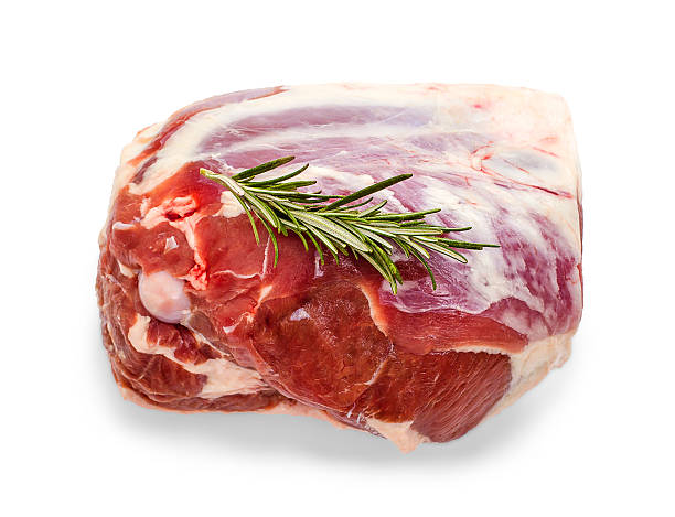 istock Frozen lamb leg with rosemary twig 499425782
