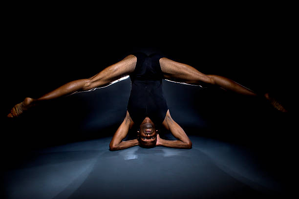 Shadow Contortionist 280+ Male Contortionist Stock Photos, Pictures & Royalty-Free Images ...
