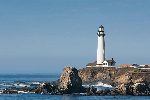 istock Pacific Coast Lighthouse and Rocky Shore 499427186