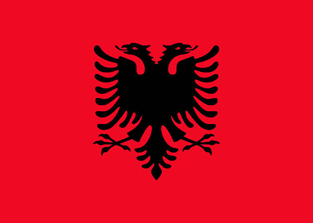 Tirana Albania flag red and black, near red light semafor