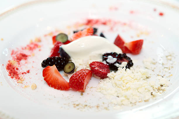 istock Berries with ice cream on plate 499427918