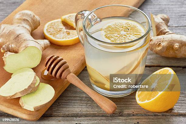 Ginger Tee With Lemon And Honey On Wooden Table Stock Photo - Download Image Now - Ginger - Spice, Lemon - Fruit, Honey