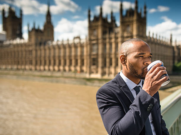 istock Businessman with coffee mug chilling in London 499429232