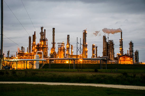 Climate Change Fossil Fuel Refinery Polluting Smog at night