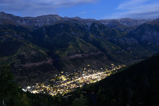 Night view of Telluride, Colorado, USA. Telluride is a resort town surrounded by mountain peaks of San Juan Mountains in the San Miguel County of southwestern Colorado. It is a very popular tourist destination year-round.