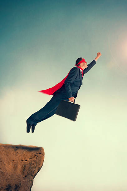 istock flying superhero businessman 499431809