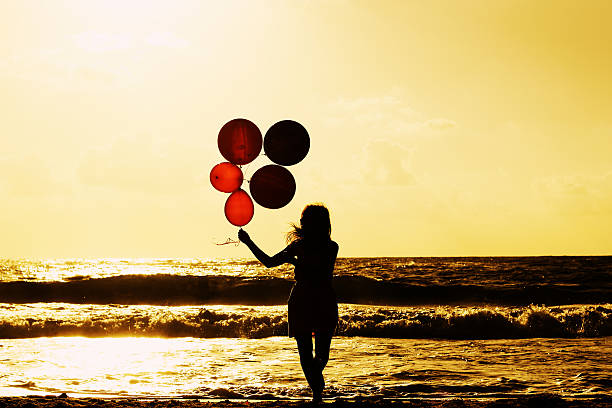 istock beautiful woman on seaside 499434753