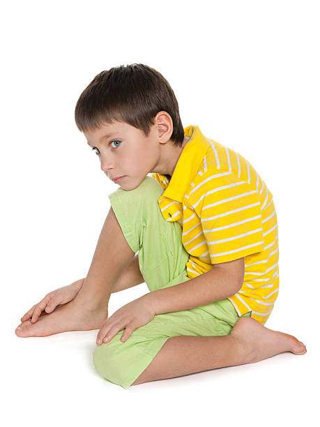 istock Profile portrait of a sad little boy 499435193