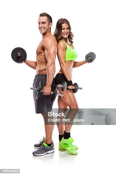 Beautiful Fitness Young Sporty Couple With Dumbbell Stock Photo - Download Image Now