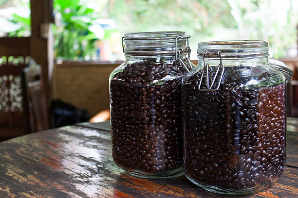 Coffee bean in bottle stock photo