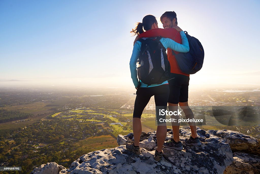 We made it A sporty young couple standing affectionately on top a mountainhttp://195.154.178.81/DATA/i_collage/pu/shoots/784344.jpg Active Lifestyle Stock Photo