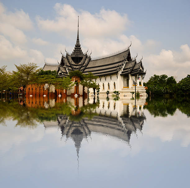 Thai temple, reflected in the water