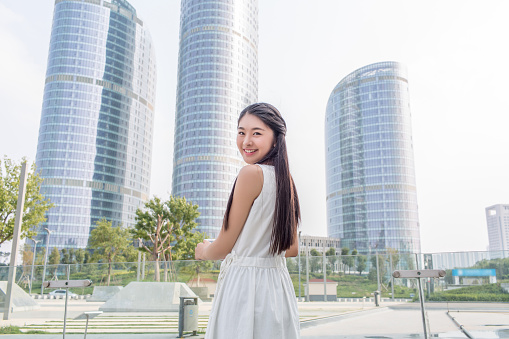 in the upscale central business district office below, stood a beautiful chinese girl